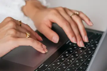 Typing On Laptop