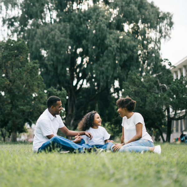Adults And Child In Park